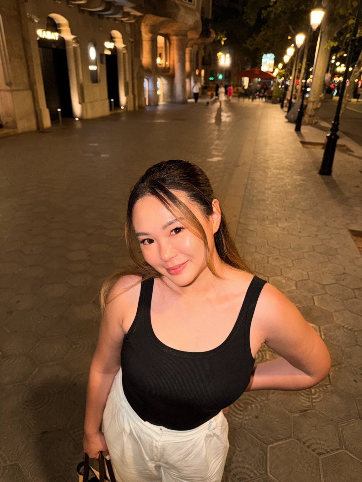 Candace standing outdoors in the evening